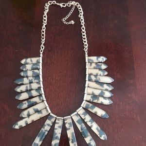 Women’s cheetah print necklace.